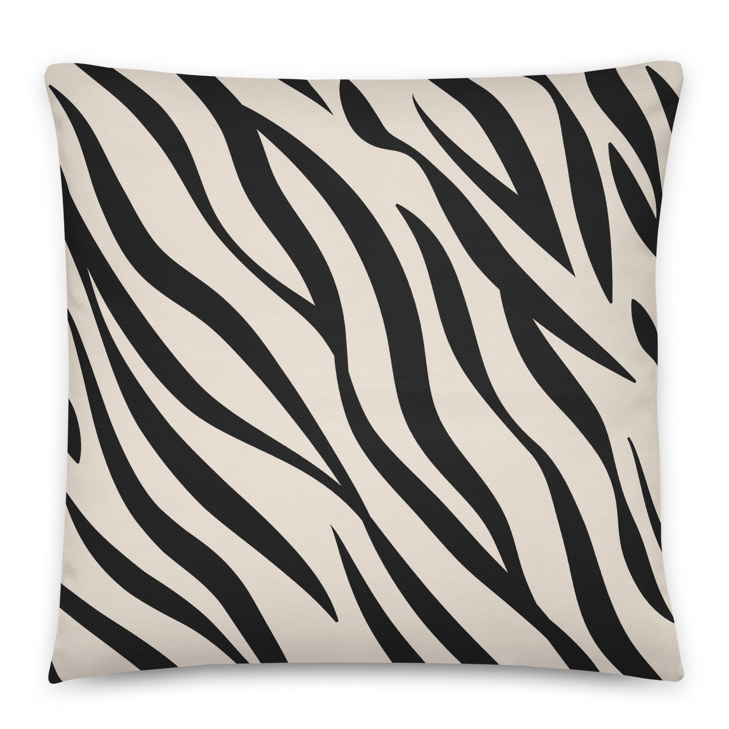 A square throw pillow featuring a bold black and cream zebra stripe pattern.