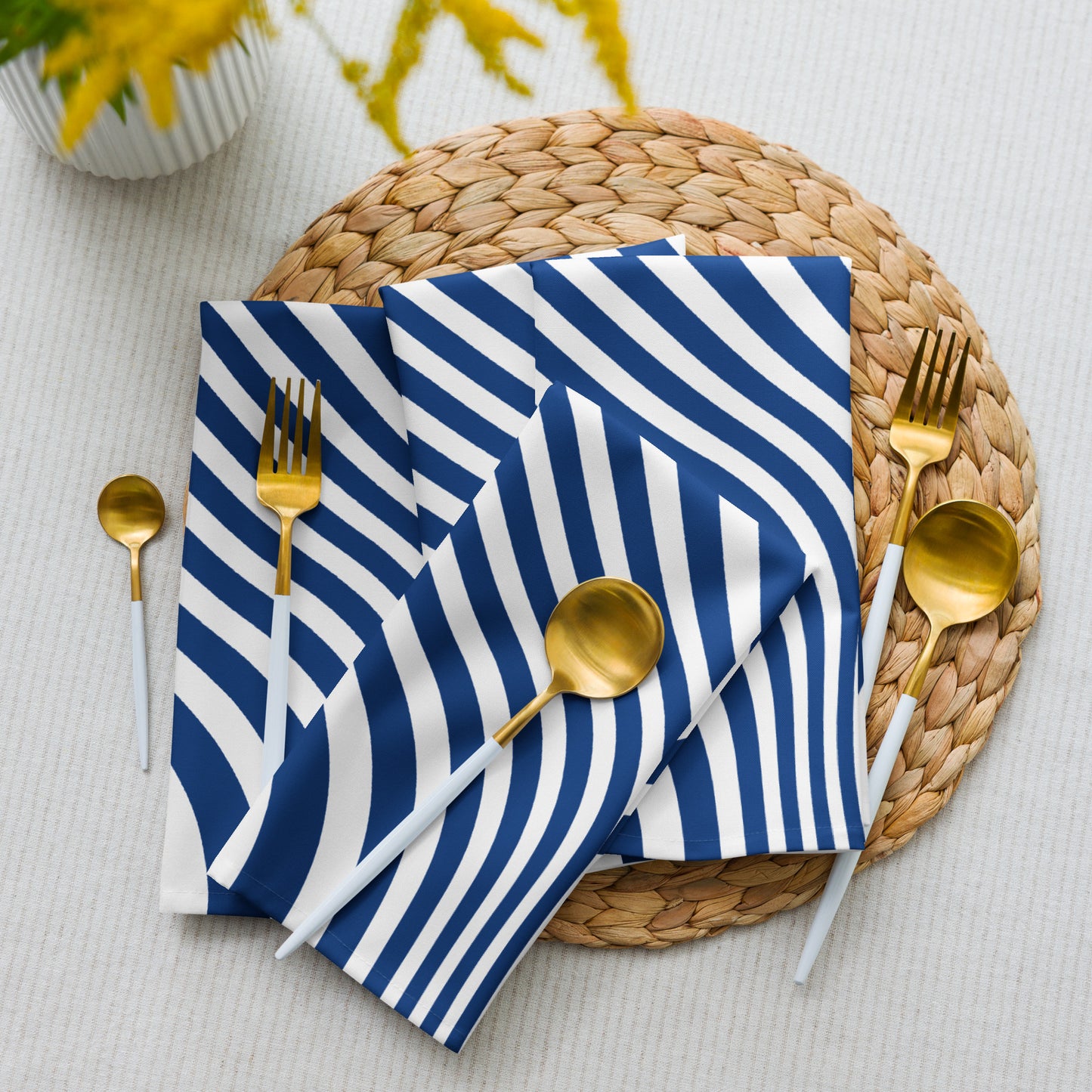 Blue and white striped dinner napkins.