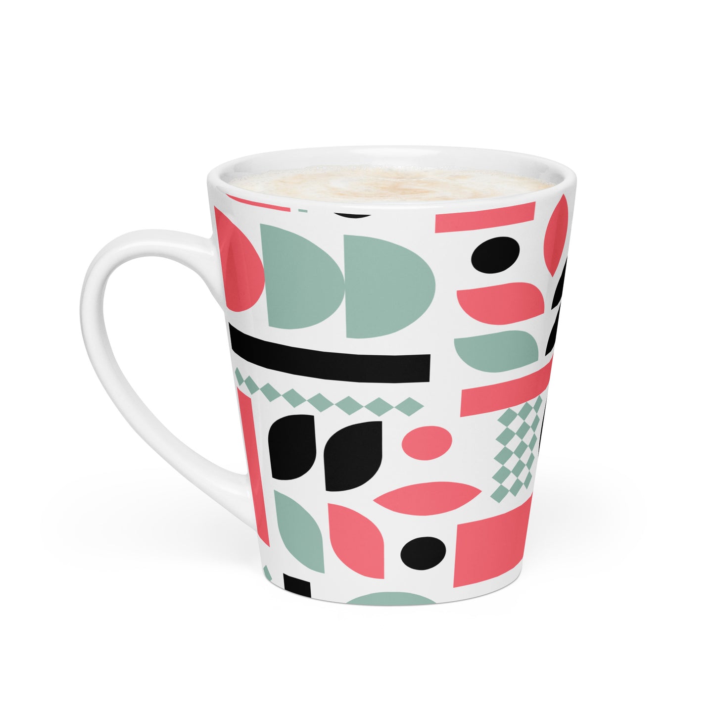 A white ceramic mug with a colorful geometric pattern of pink, mint green, black, and coral shapes.