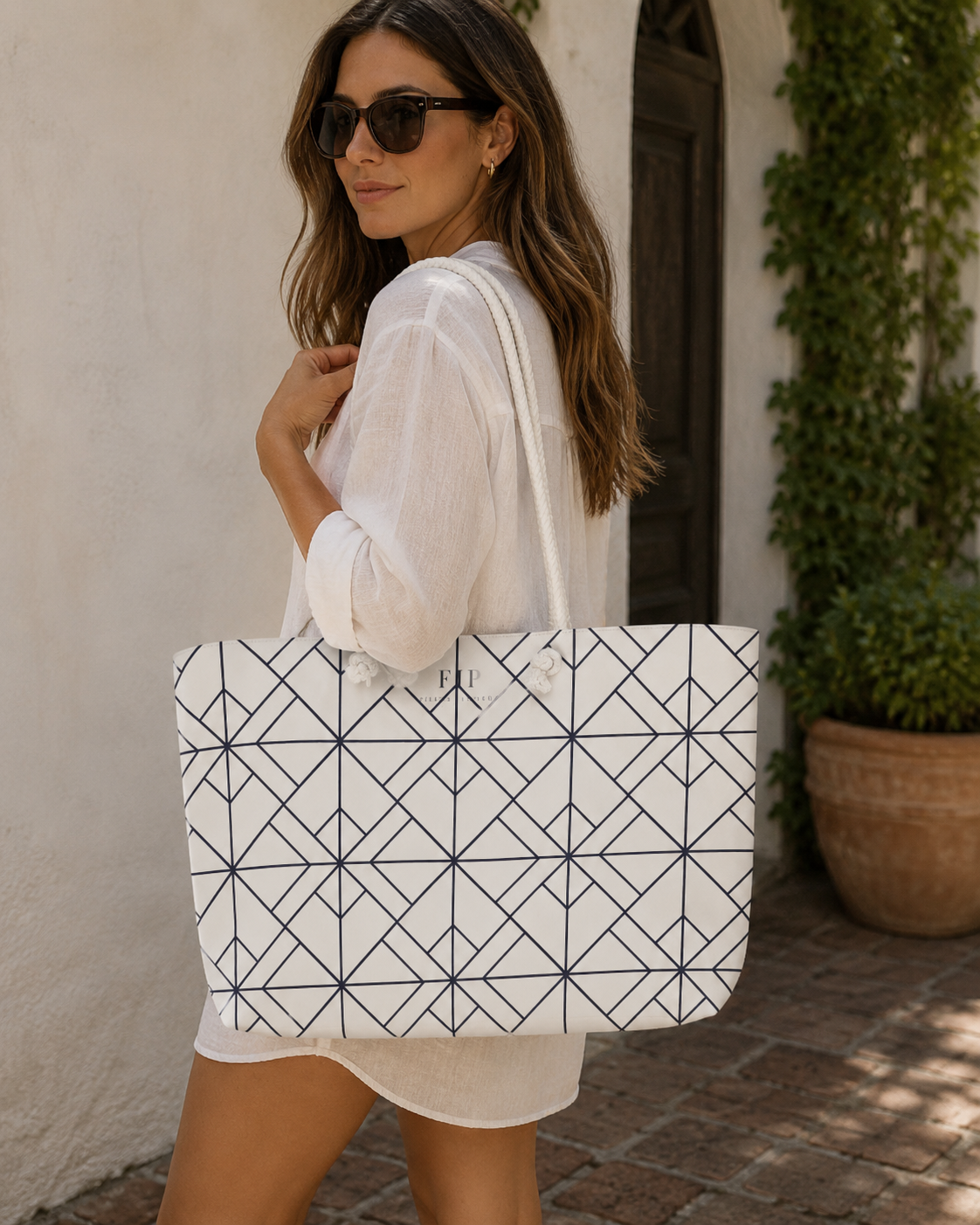large white tote bag with a black geometric line patter