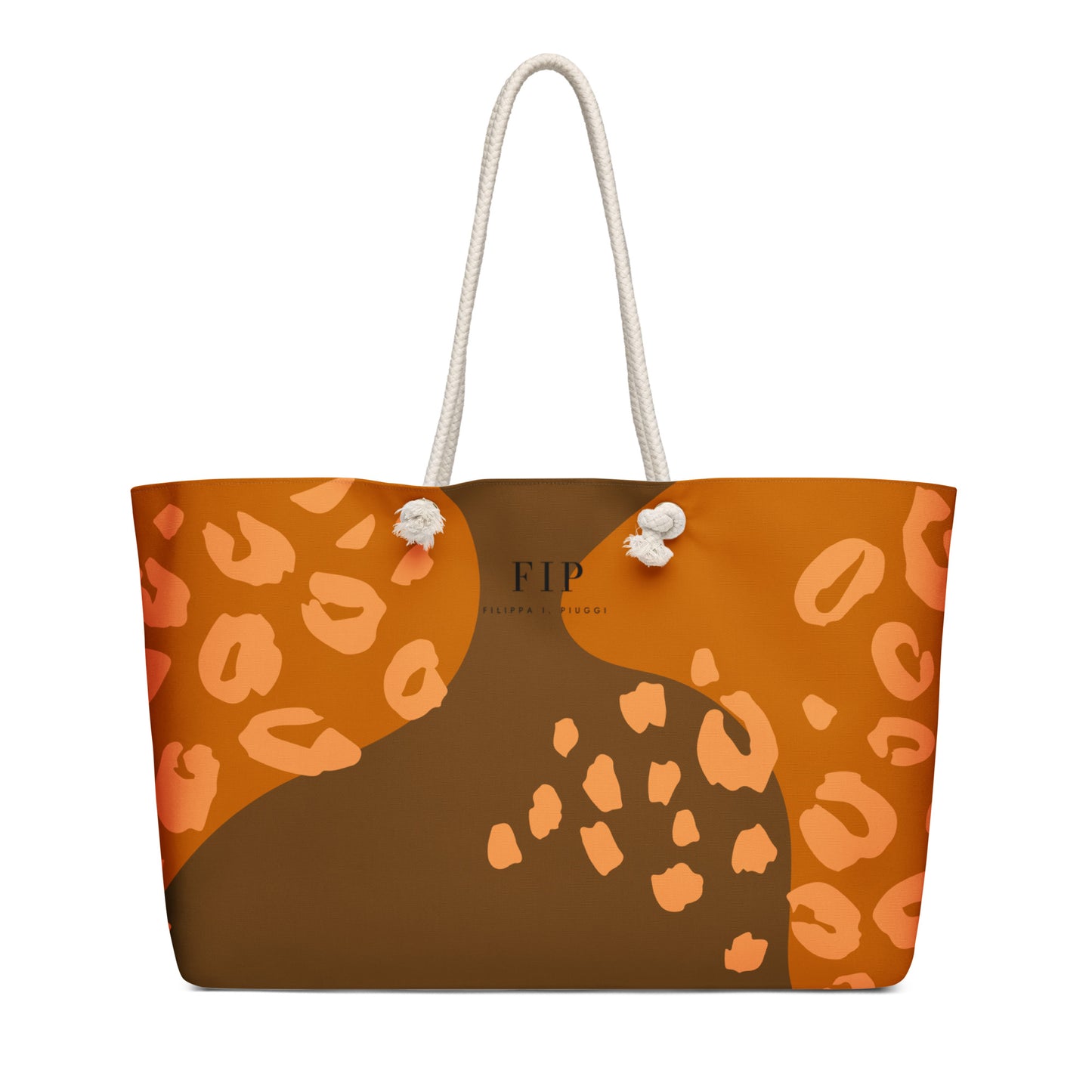 A structured tote bag with a bold orange, brown, and peach abstract leopard print design, featuring cream-colored rope handles.