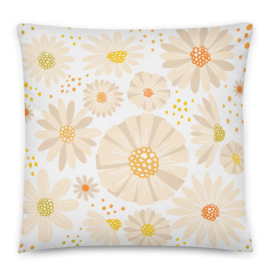 A square throw pillow featuring a retro-style floral pattern of daisies in beige, cream, yellow, and orange.