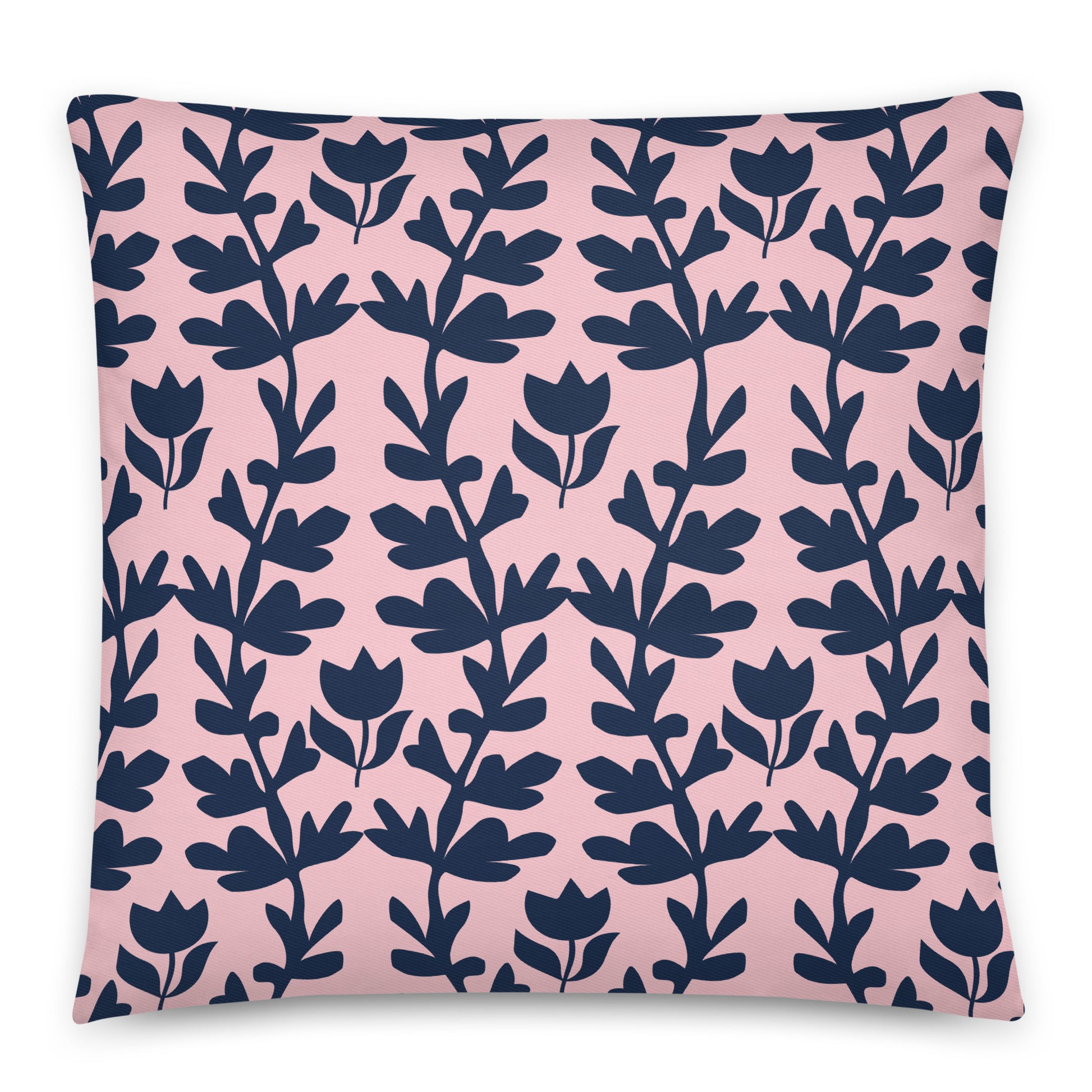 A square throw pillow featuring a repeating navy blue botanical vine pattern on a soft pink background.