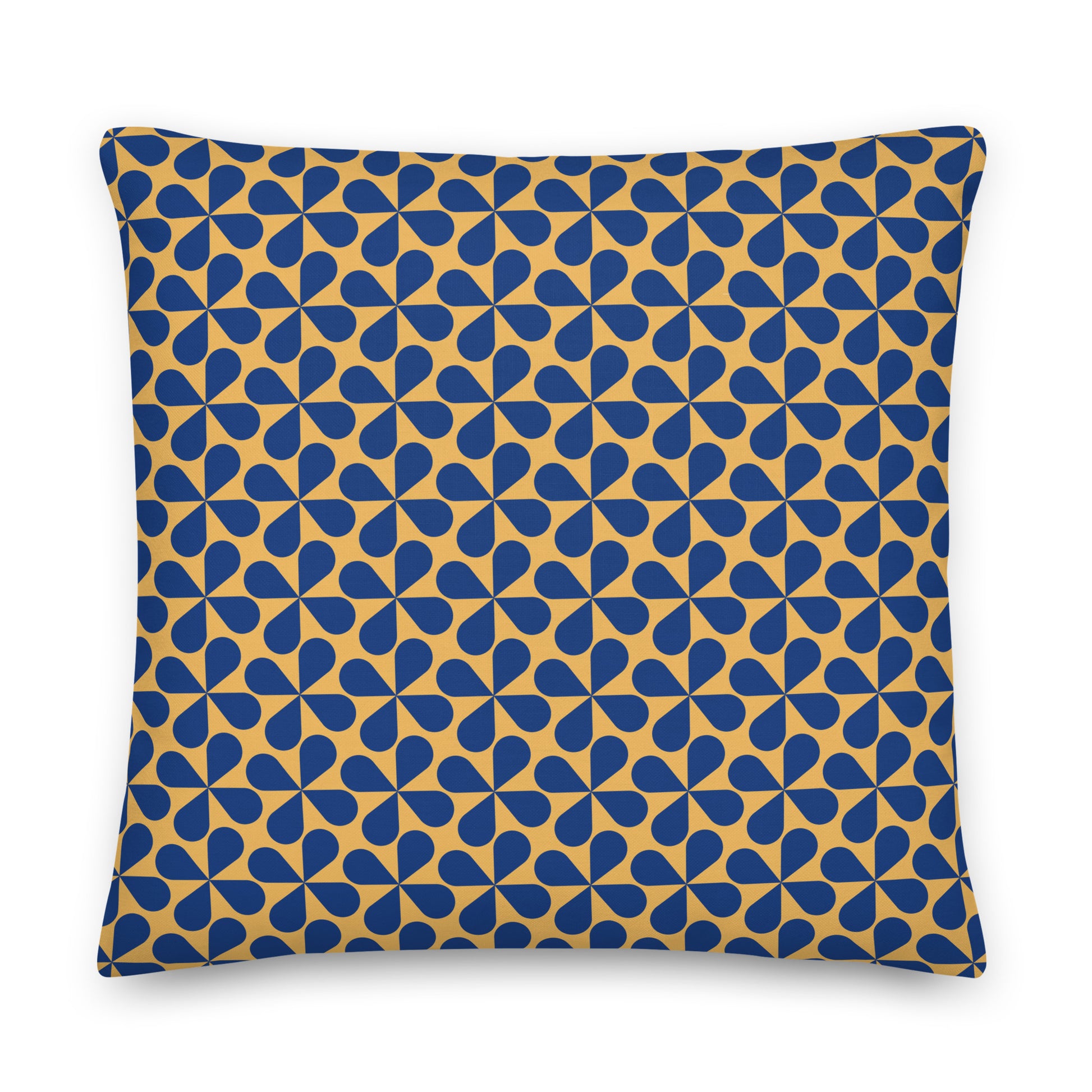 A square throw pillow featuring a repeating geometric pattern of blue teardrop shapes on a mustard yellow background