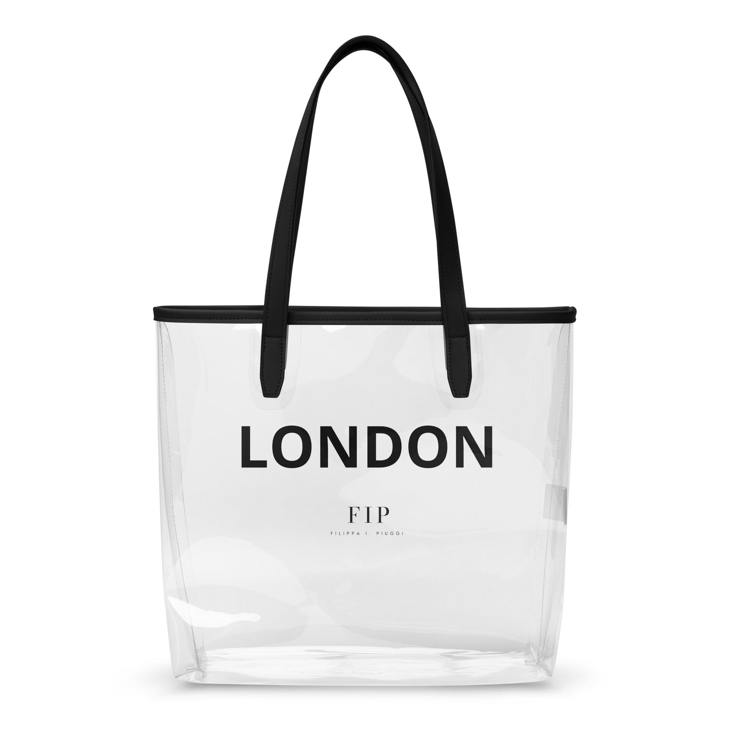 Clear tote bag with black handles and text London 