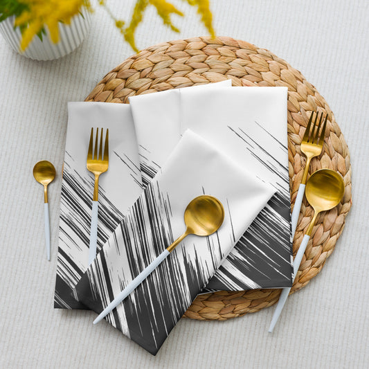 White and black abstract-patterned paper napkins. 