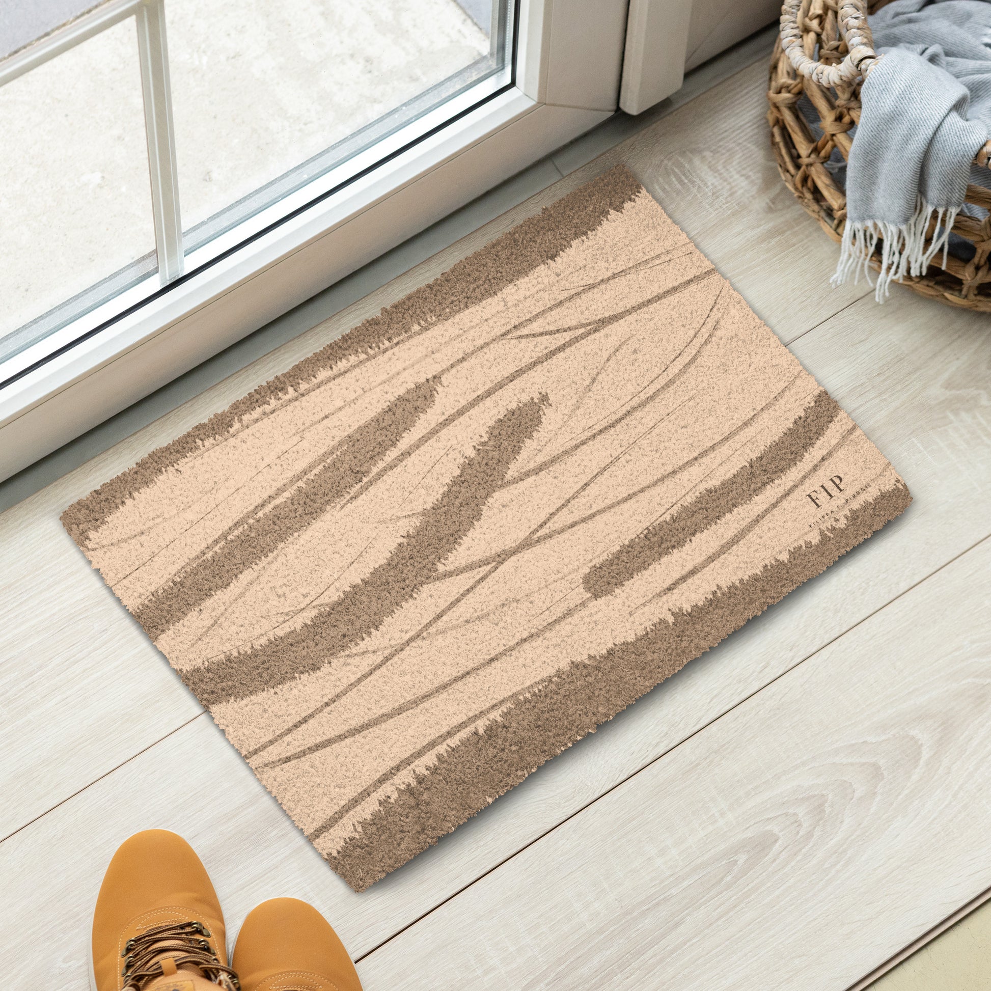 A rectangular beige and brown textured doormat with wavy stripe patterns. 