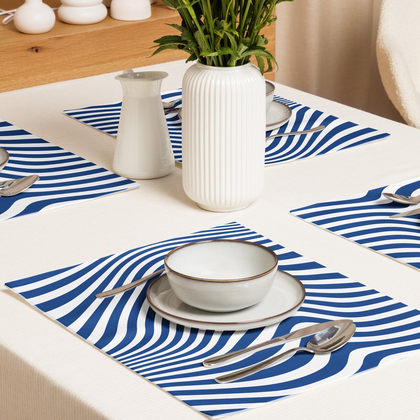 Blue and white wavy striped placemats. 