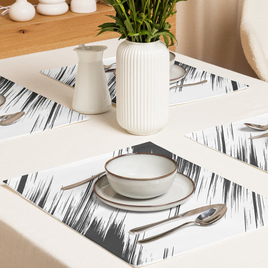 rectangular placemats with a black and white brushstroke pattern