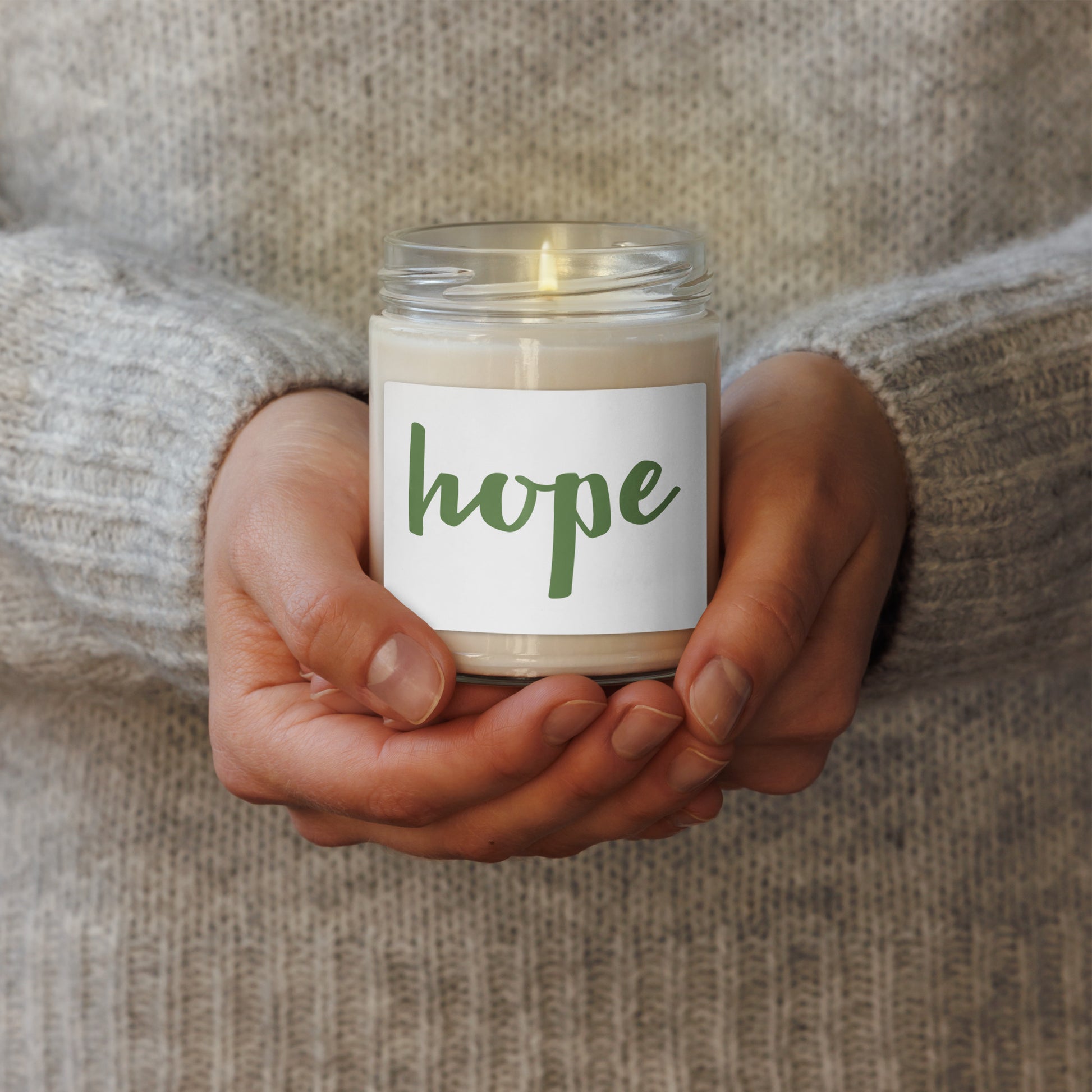soy scented candle with hope text in green