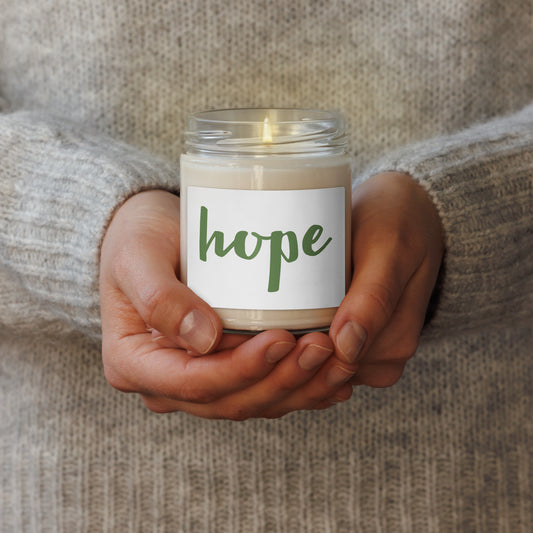 soy scented candle with hope text in green