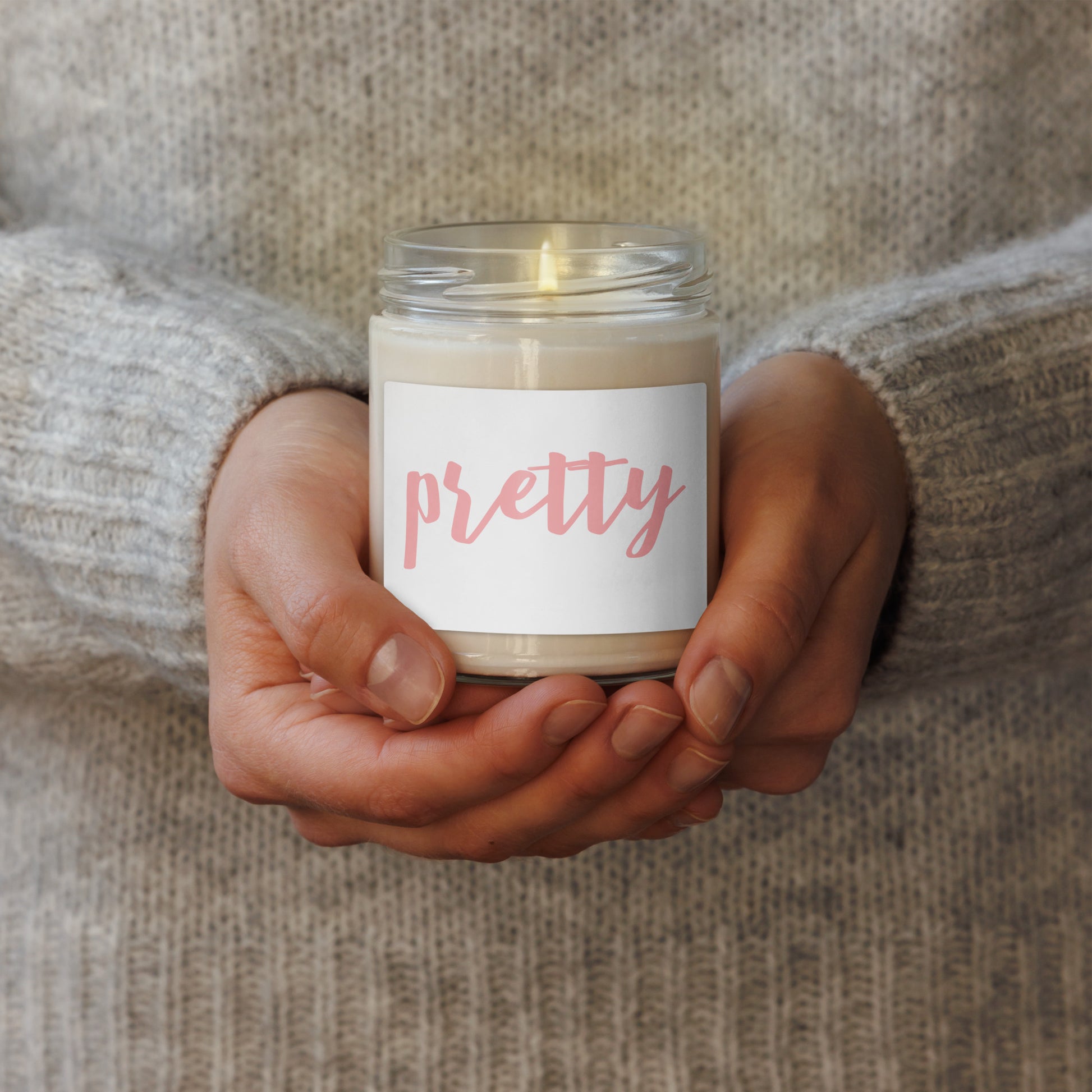 pretty soy scented candle in pink text 