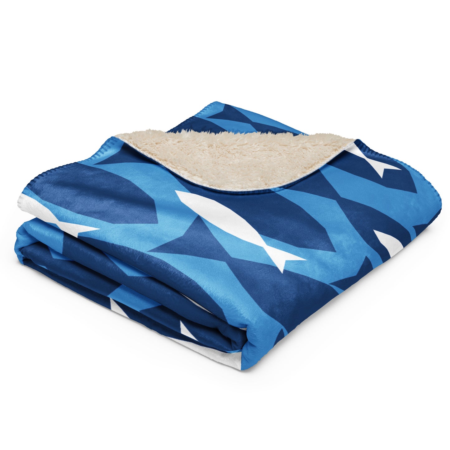 throw blanket with a blue geometric coastal pattern and a beige sherpa lining
