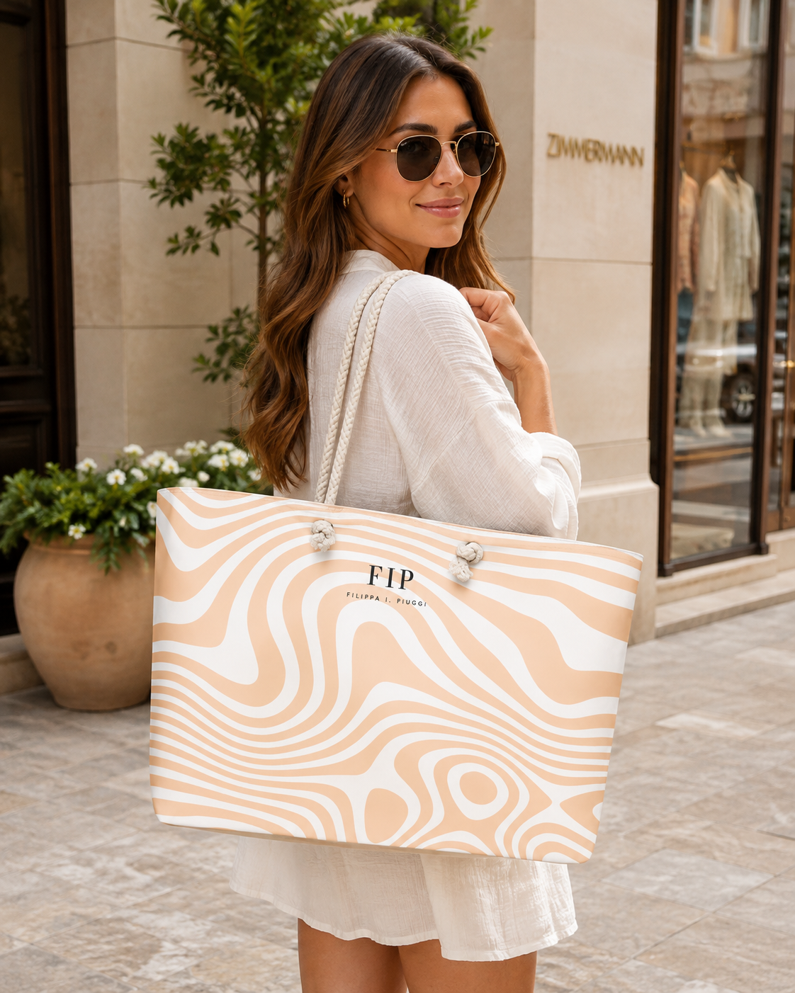 large tote bag with a beige and white wavy pattern. 