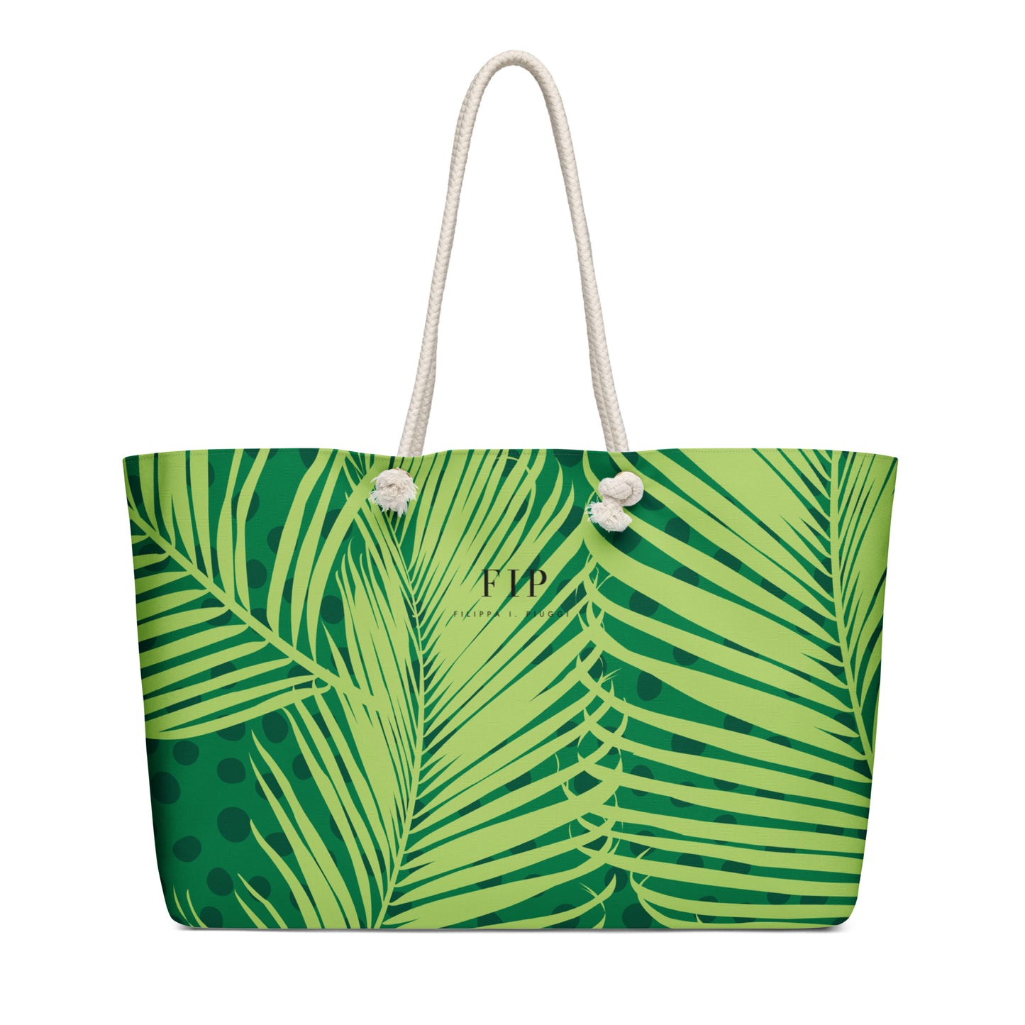 A green and lime tropical palm leaf print tote bag with white rope handles. 