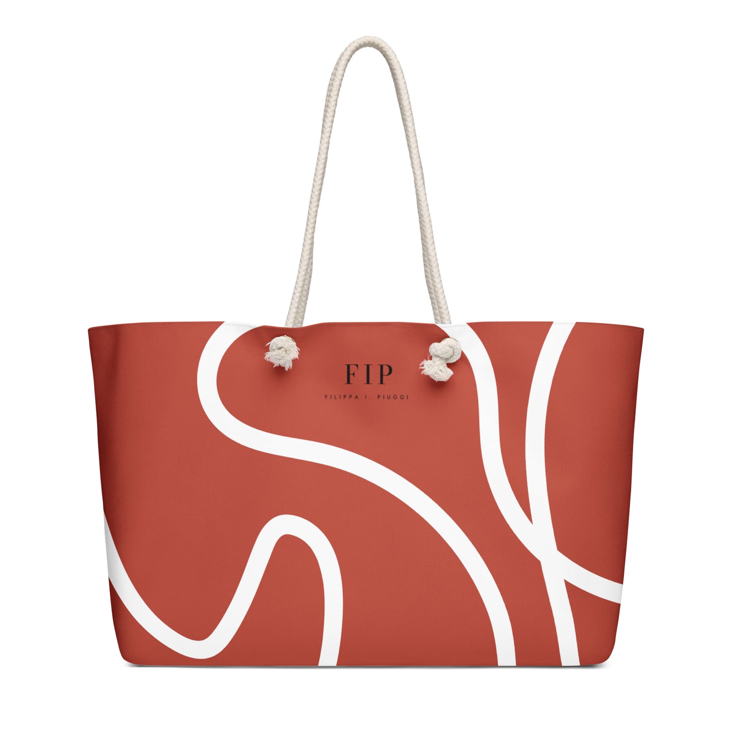 A terracotta red tote bag with white abstract wavy lines and a white rope handle.