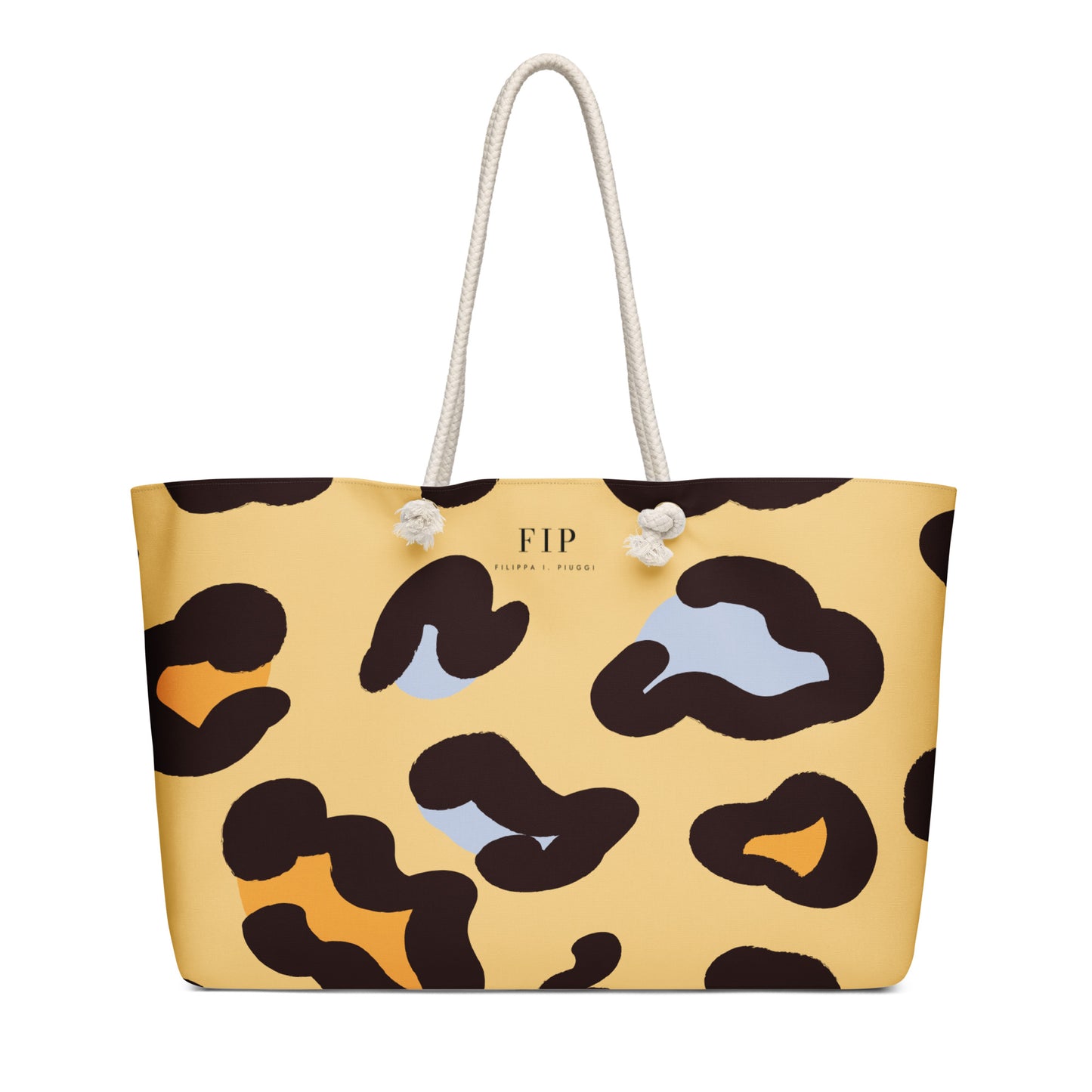 A yellow tote bag with a leopard print pattern in black and light blue, featuring white rope handles 